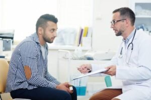 Doctor talking to a patient - Direct Primary Care vs Concierge: Cost and Benefits