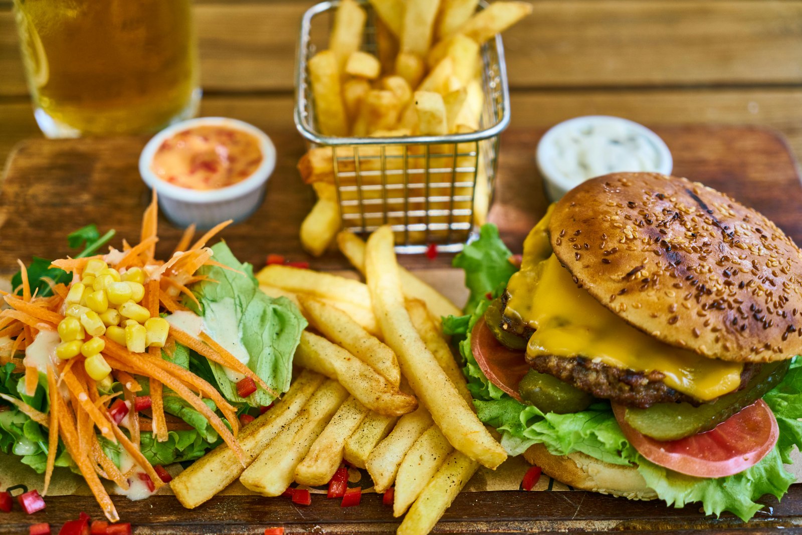 Picture Shows a Burger, Chips and Veggie Salad-Causes and Prevention of Diabetes-2725744.jpg