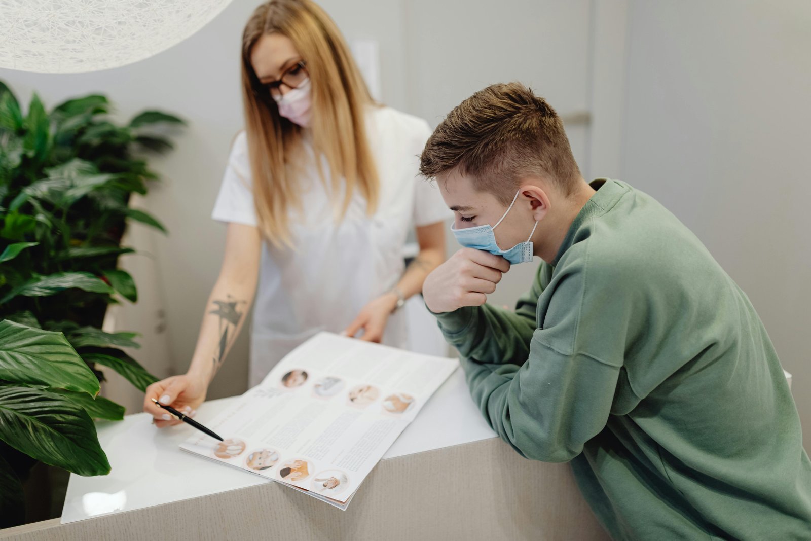 A Nurse Showing a Patient their Treatment Plans-What Is a Chronic Disease Management Plan-6627902.jpg