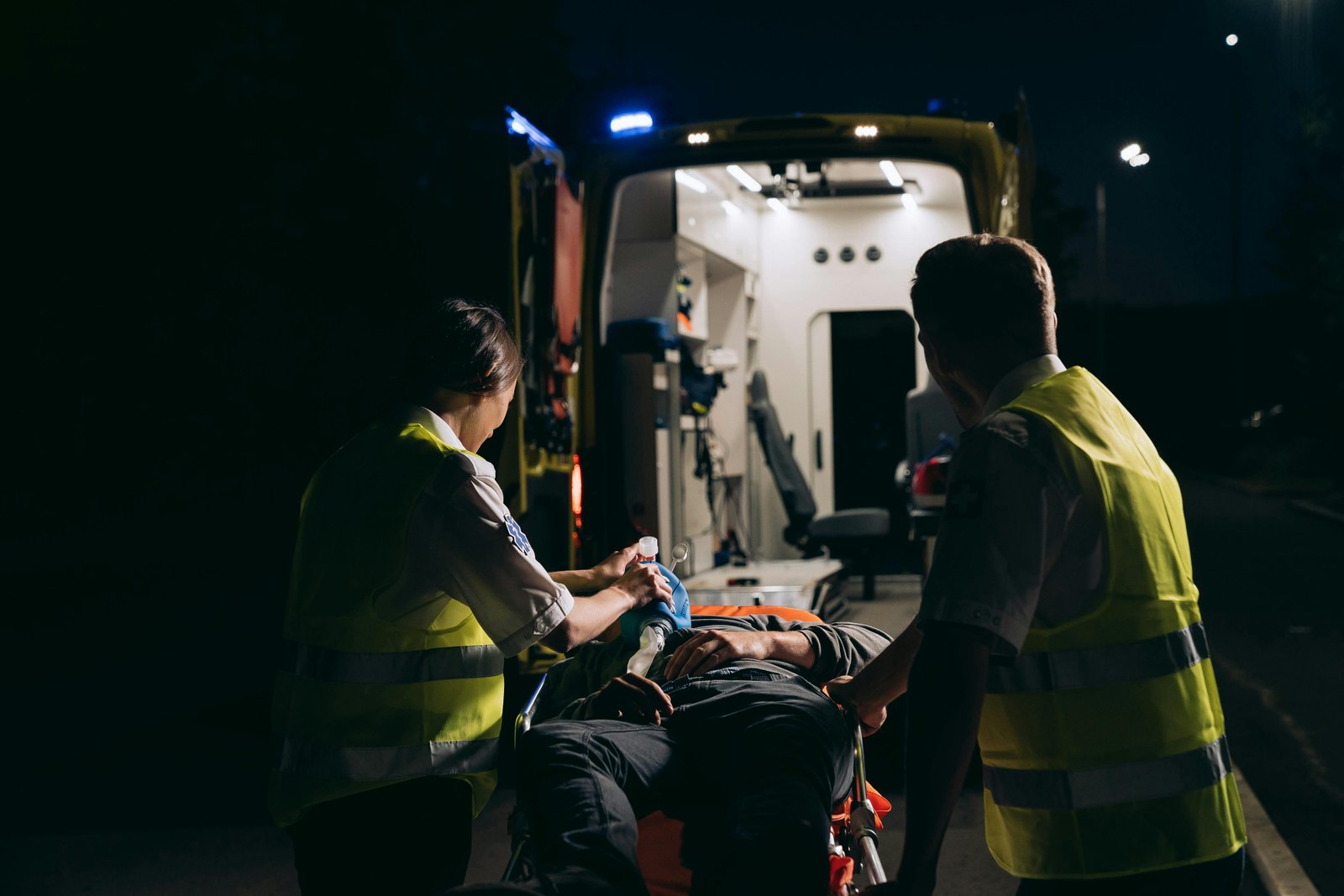 Two Paramedics Administrating First Aid Treatment to a Patient-Medical Emergencies-8942729.jpg