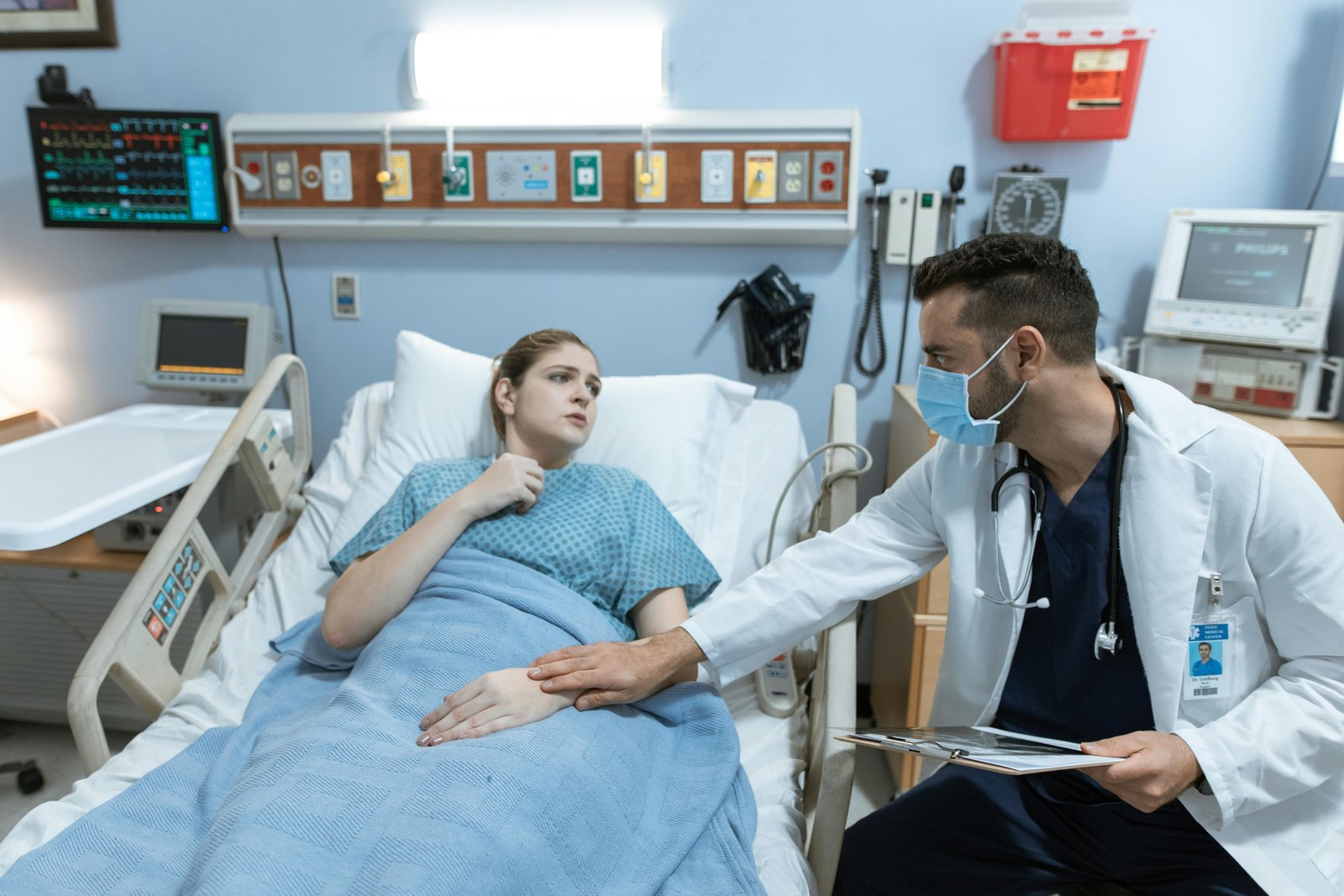 A Doctor Talking with an Admitted Patient-6129158.jpg