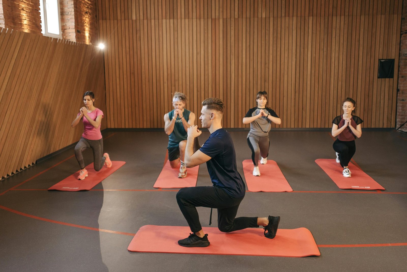 Exercise and Chronic Disease Prevention: A group of people in a yoga class.